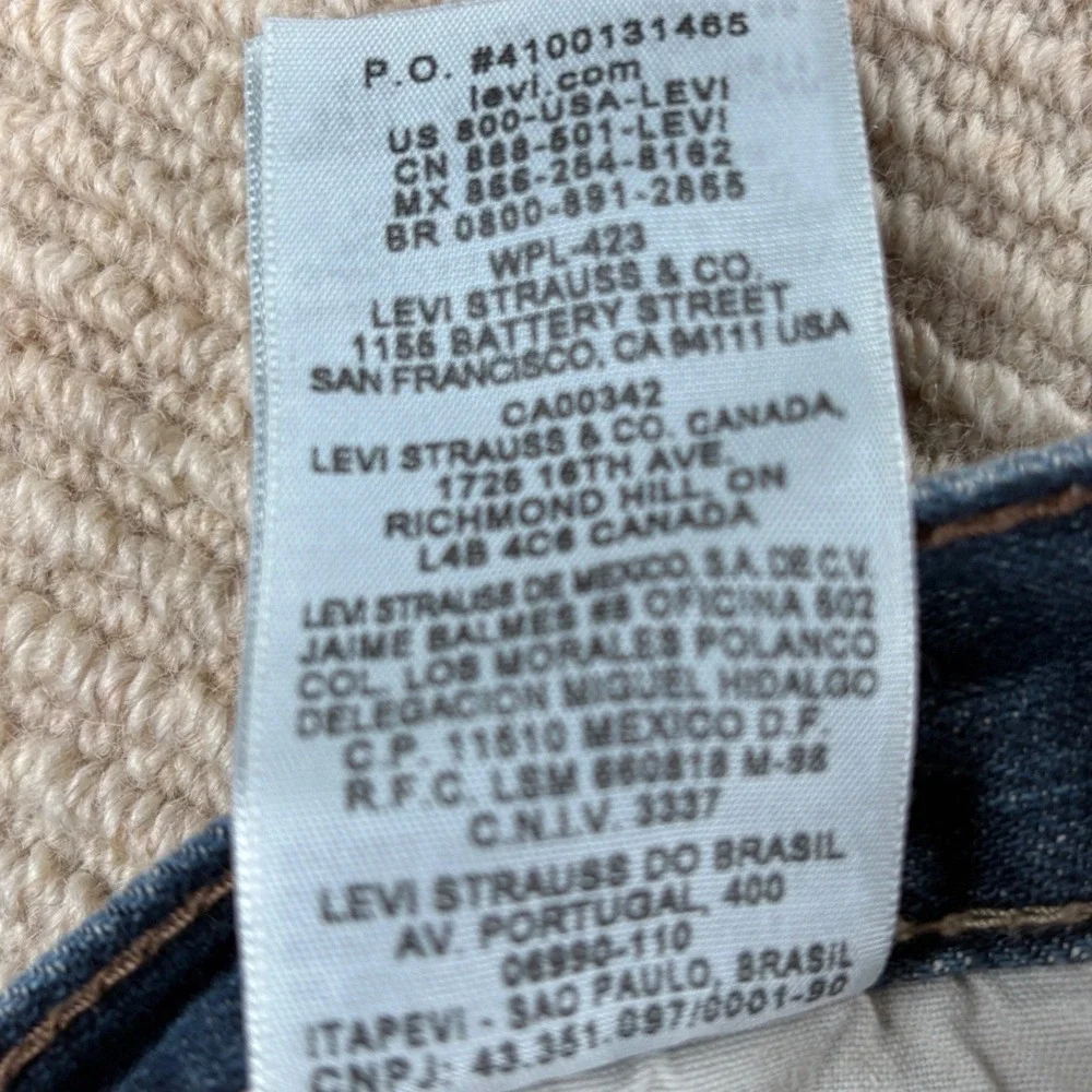 Levi's 569 Loose Straight Jeans Mens 42x30 Tag 42x28 Actual Med Wash Blue Denim